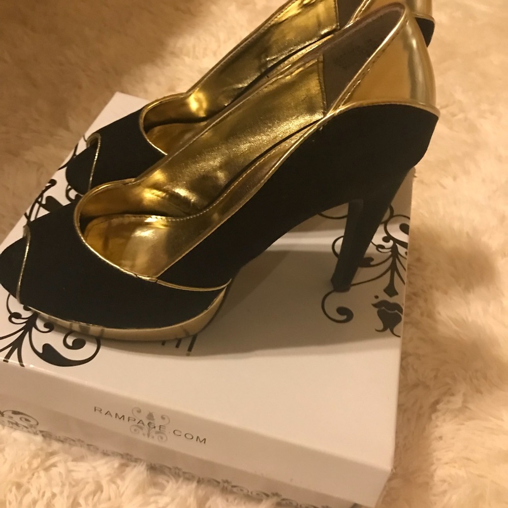 Peep toe black and gold heels. Excellent condition